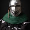 Houndskull bascinet helmet with green padded coif worn on fighter, front three-quarter view showing perforated visor and leather chin strap